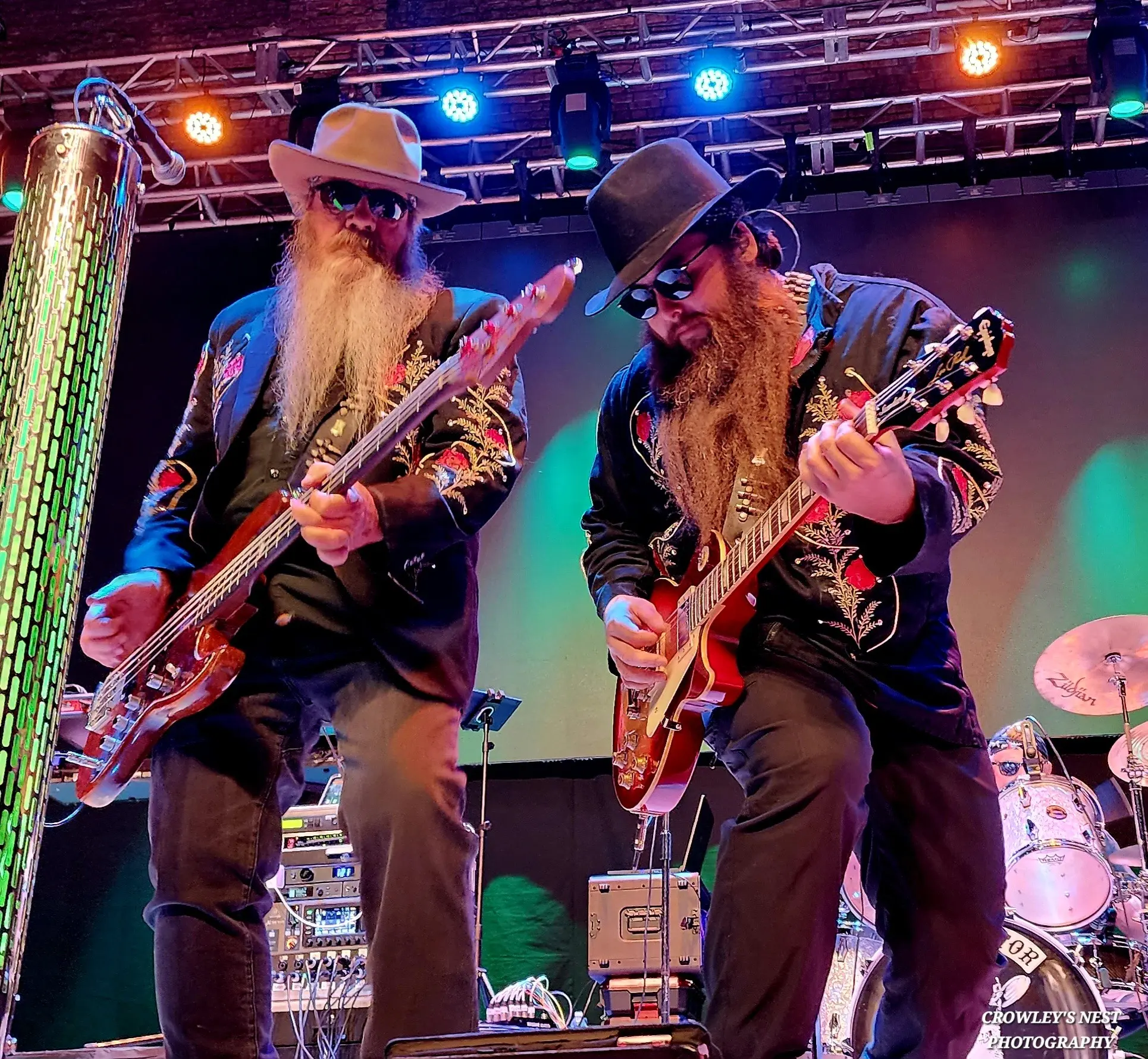 Eliminator — Ron and David leaning in, drummer behind